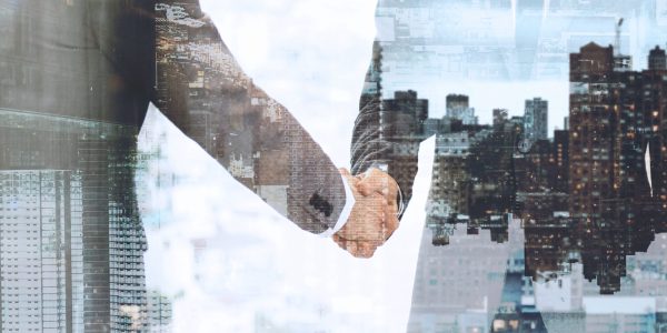 Corporate business handshake between business partners