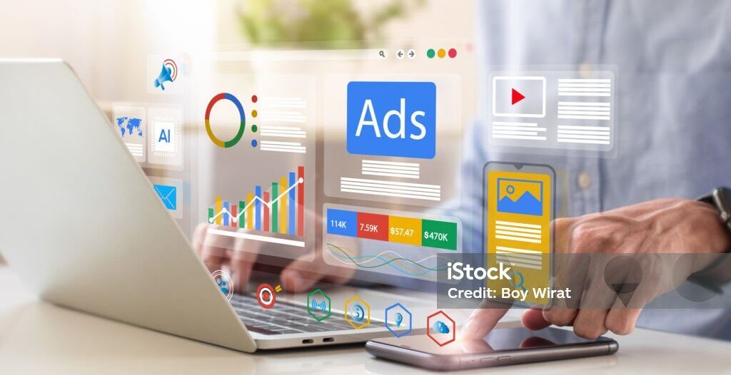 Digital marketing concept, Businessman using laptop with Ads dashboard digital marketing strategy analysis for branding. online advertisement, ad on website and social media. SEO. SMM.